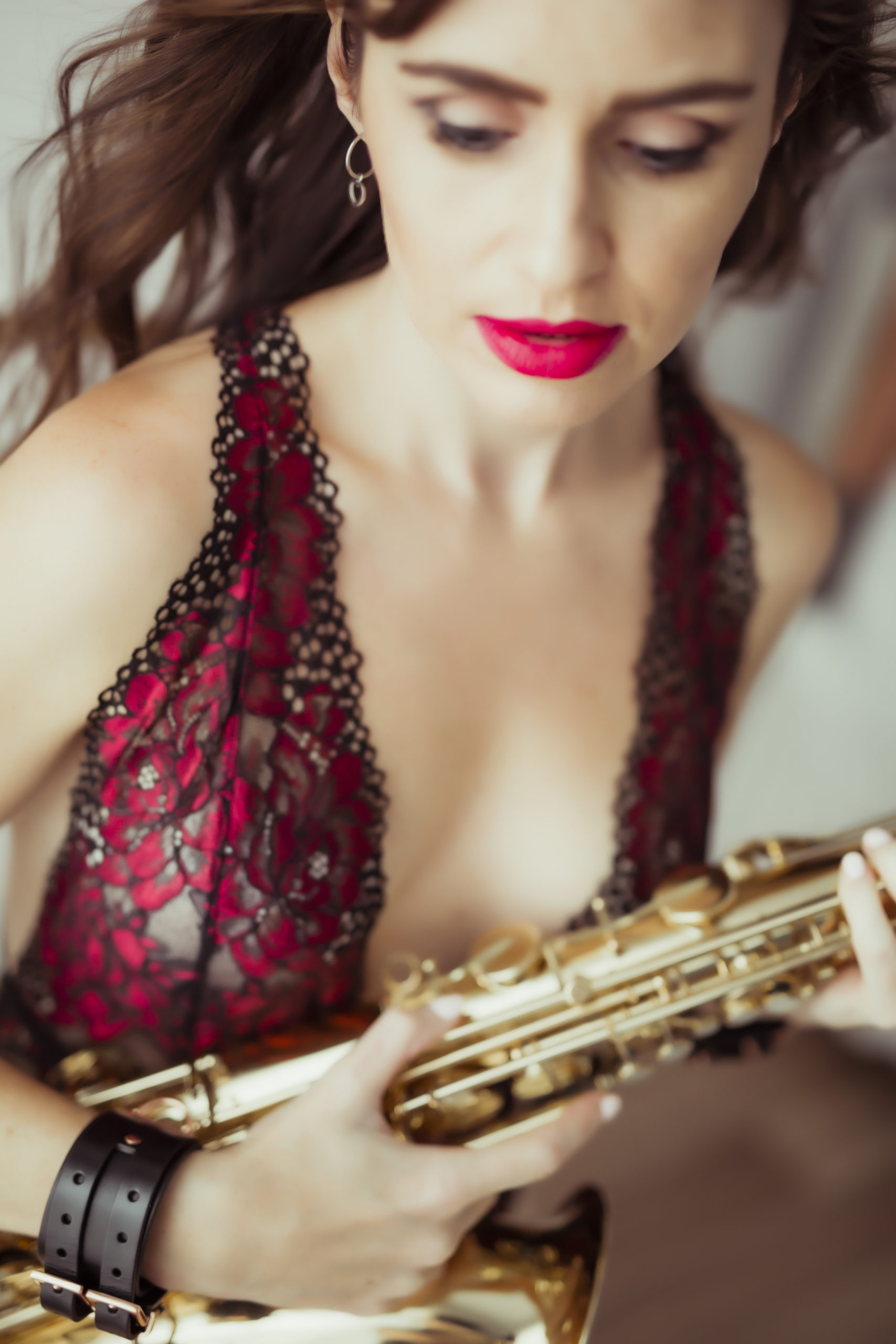 Red lips boudoir Shoot with saxophone